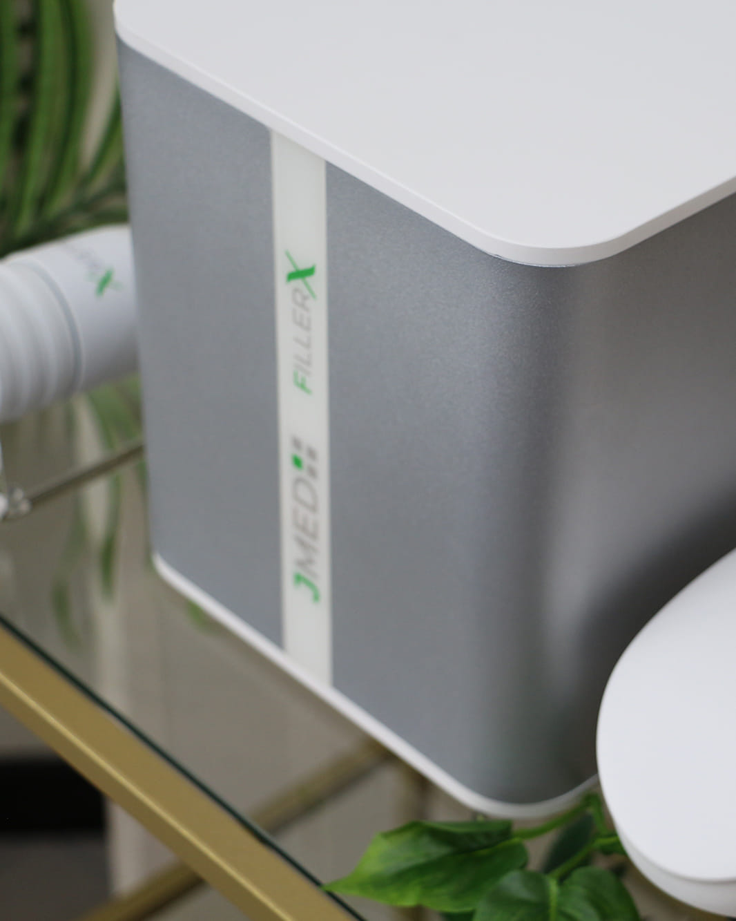 Close-up of the Filler X device by JMED — a compact skincare technology designed to treat acne, rosacea, psoriasis, and cellulite with fast, visible results.