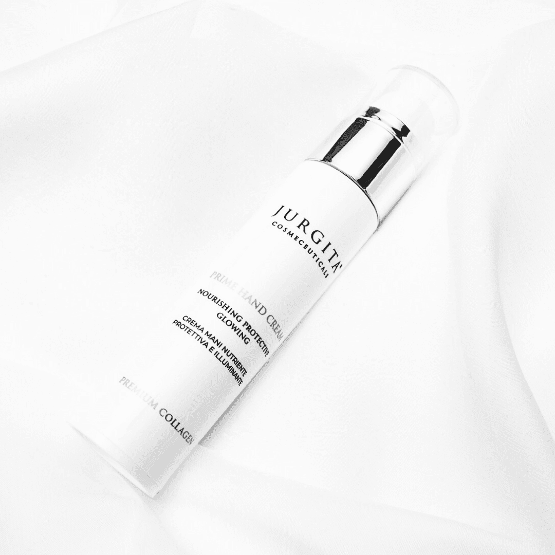 Jurgita Cosmeceuticals Prime Hand Cream in an elegant white pump bottle with a sleek design, providing deep moisture and protection for soft, nourished hands.